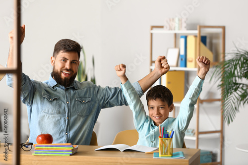 Little boy with his father ...