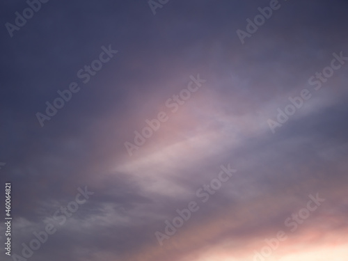 Clouds in the sunset sky. © faegga