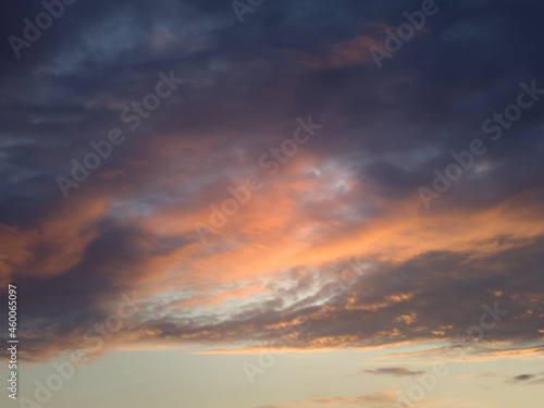 Clouds in the sunset sky. © faegga