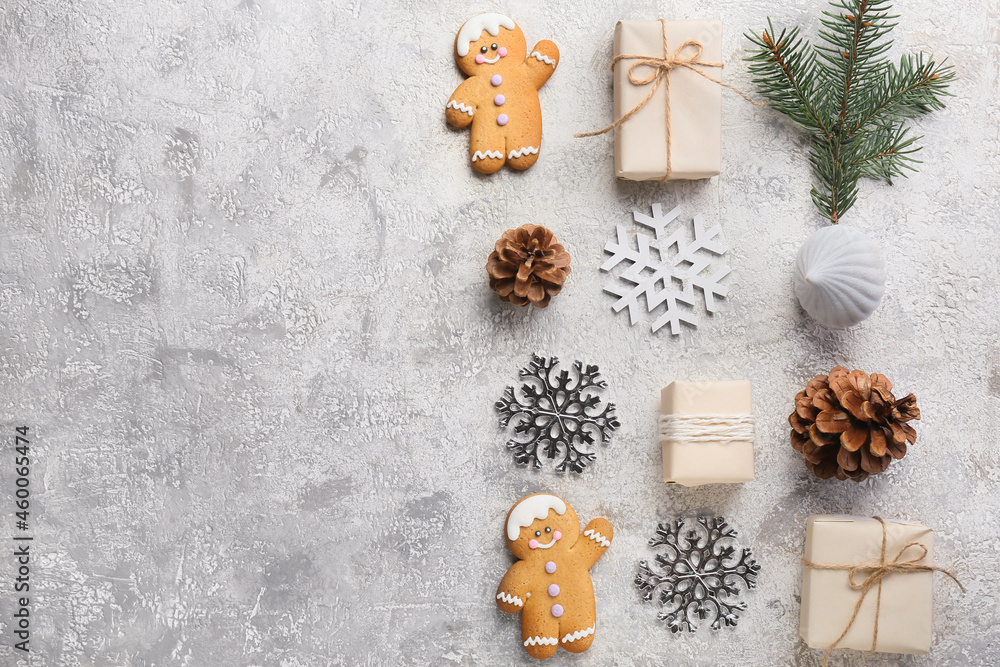 Christmas gifts with decor and cookies on grunge background Christmas gifts with decor and cookies on grunge background