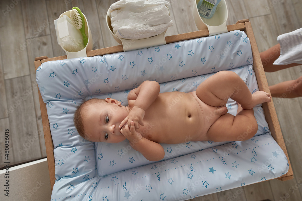 Naked Baby Babe On Nursery Pad Top View Stock Foto Adobe Stock