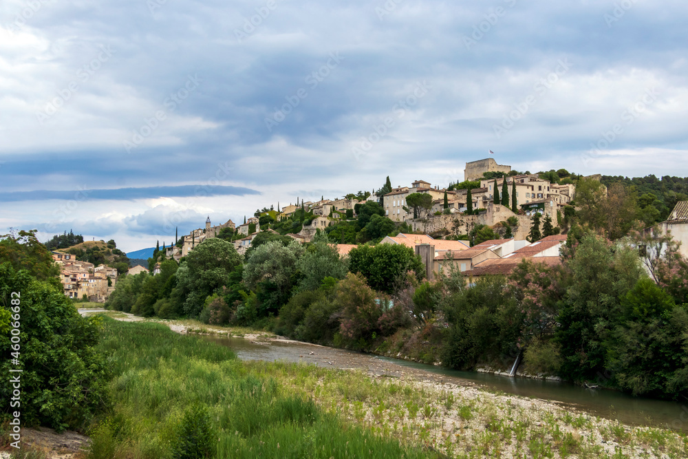 Roman village Vaison-la-Romaine in two sides of the Ouveze river, Provence, France