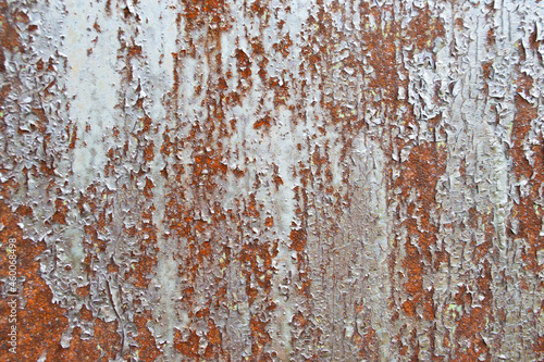 Rust metal background. Rotten steel, metal texture with scratches and cracks.