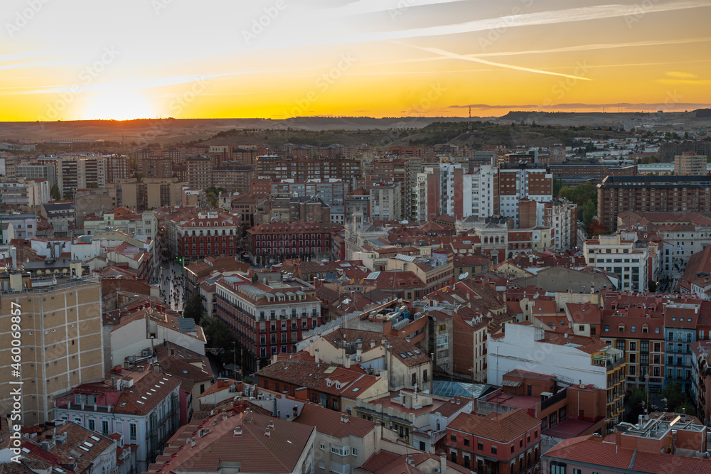 sunset over the city of Valladolid in Spain from the air