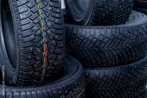 photographs of car tires, detailed and general plan. tires are folded in rows or on each side