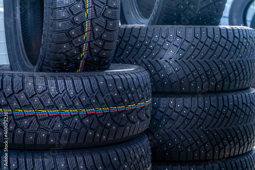 photographs of car tires, detailed and general plan. tires are folded in rows or on each side