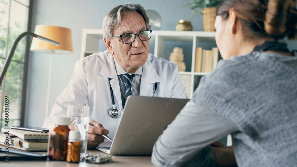 Doctor and patient talking in clinic	