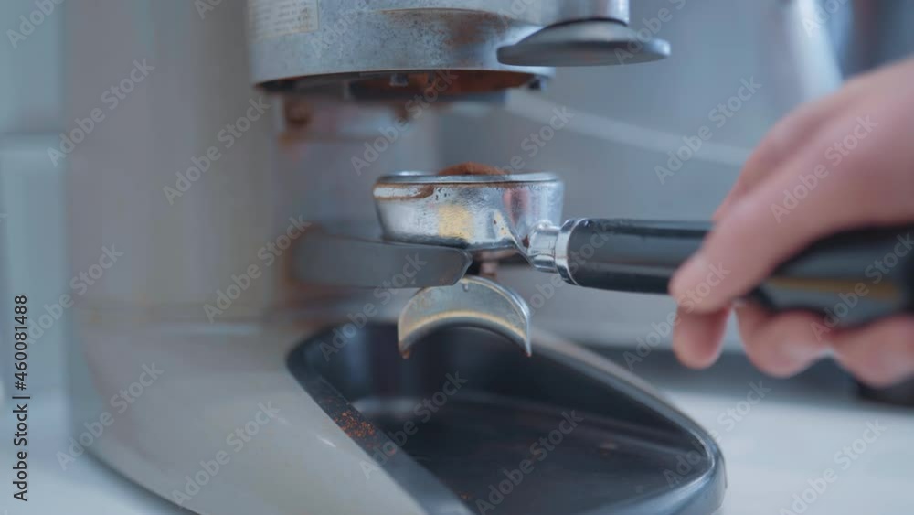 Barista making coffee with coffee machine in cafe, 4k video footage Barista making coffee with coffee machine in cafe, 4k video footage
