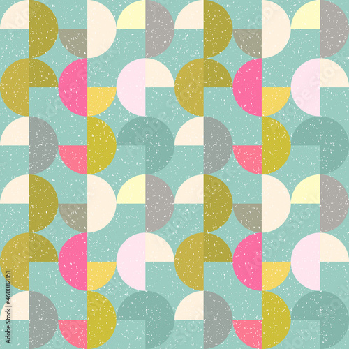 Modern vector abstract seamless geometric pattern with semicircles and circles in retro scandinavian style. Pastel colored colorful shapes with worn out texture .