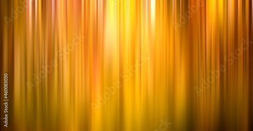 Gradient vertical blurry yellow lines background motion blur golden stripes abstract waterfall banner photo
