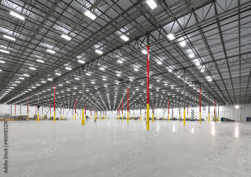 Interior of large empty modern warehouse building