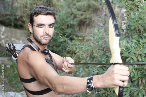 Futuristic archer in the forest