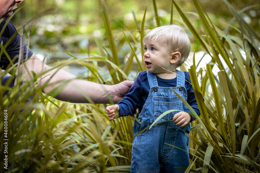 Little blond haired boy standing in the nature Little blond haired boy standing in the nature