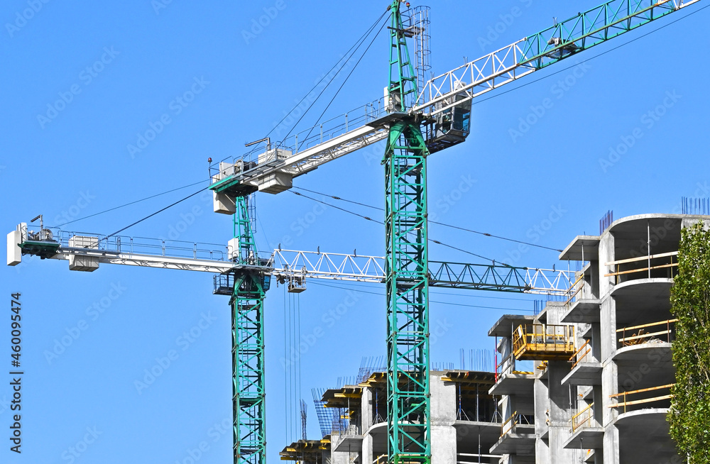 Crane and highrise construction site