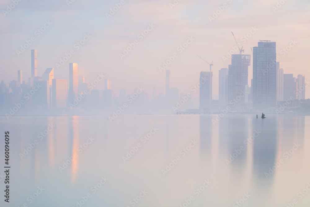East River view on a foggy day during sunrise