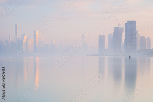 East River view on a foggy day during sunrise