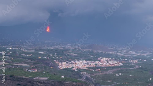 day to night time lapse of cumbre vieja volcano in La Palma Island during eruption in september 2021 photo