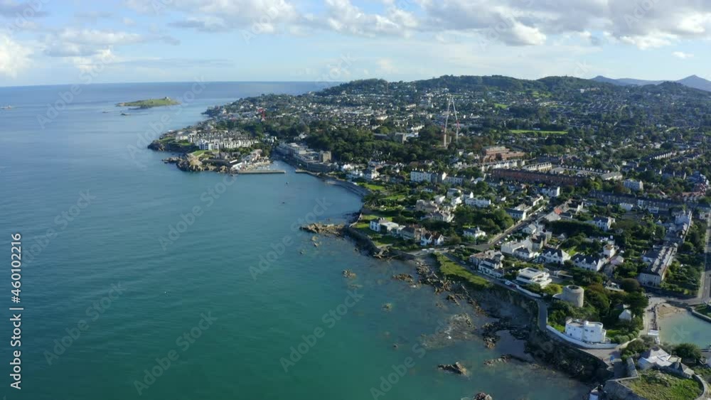 Bullock Harbour, Dalkey, Dublin, Ireland, September 2021. Drone slowly pushes along the coastline from Sandycove with Dalkey Island and Killiney Hill in the background. Bullock Harbour, Dalkey, Dublin, Ireland, September 2021. Drone slowly pushes along the coastline from Sandycove with Dalkey Island and Killiney Hill in the background.