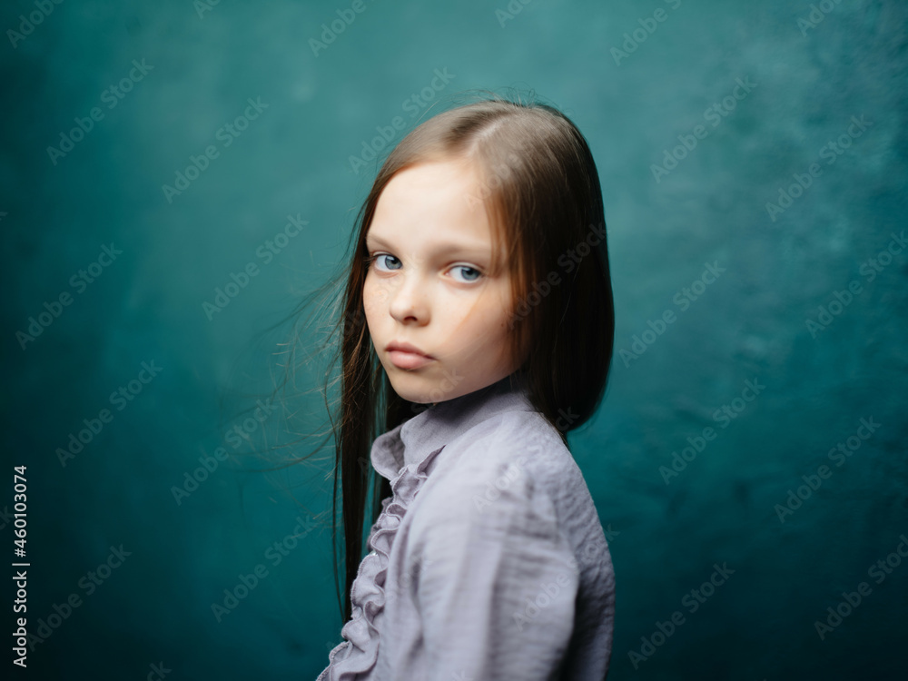 Girl in dress long hair studio green background close-up Girl in dress long hair studio green background close-up