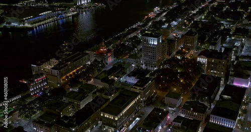 Savannah Georgia Aerial v38 panning shot from historic downtown district tilt up toward hutchinson island at night - Shot with Inspire 2, X7 camera - October 2020 photo