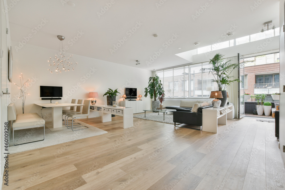 Modern living room interior with furniture and potted plants Modern living room interior with furniture and potted plants
