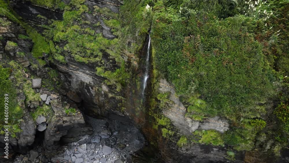 Aerial view of an idyllic waterfall at tropical coastline scenery. High quality 4k footage Aerial view of an idyllic waterfall at tropical coastline scenery. High quality 4k footage
