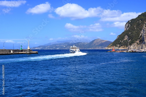 Boats of all sizes moored near the coastline of the island of Capri, Italy © Dynamoland