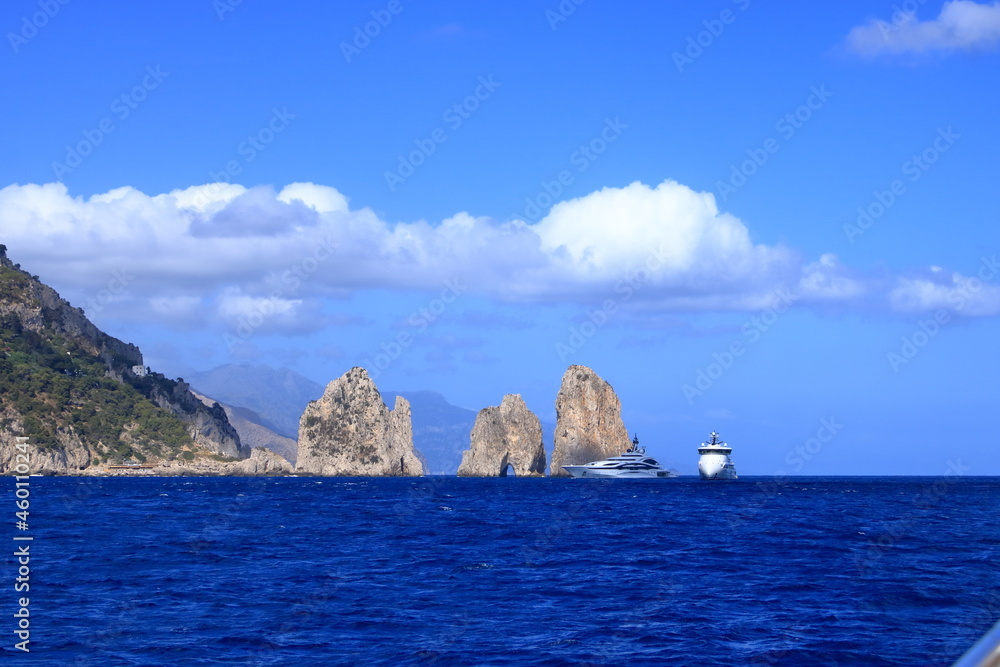 Naklejka premium The Faraglioni Rocks on the coast of the island of Capri, Italy