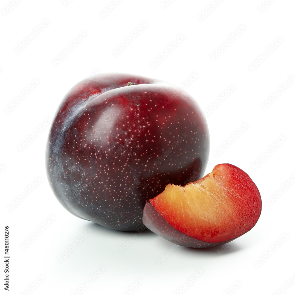 Plum with slice isolated on white background Plum with slice isolated on white background
