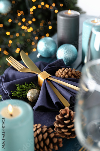 New Year table setting with bokeh on wooden table
