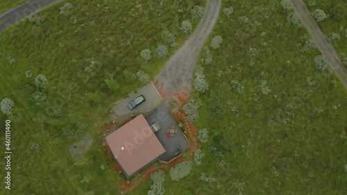 aerial drone view of the country side of southerner Iceland during the later summer months.  the beautiful greens landscape is filled with farms animals grazing on the pasture