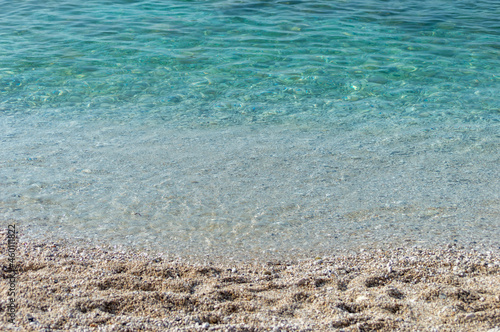 Fototapeta Naklejka Na Ścianę i Meble -  Capobianco beach in Elba Island, Italy. White pebbles and cristal clear turquoise water
