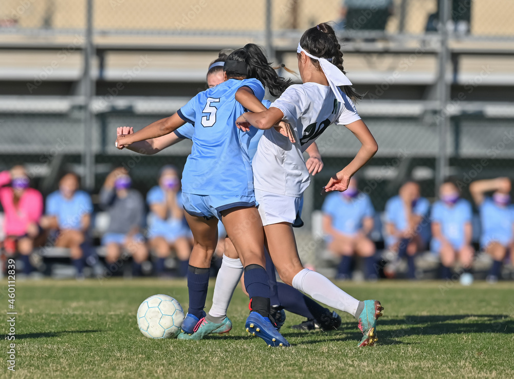 High school girls competing in a soccer match in south Texas High school girls competing in a soccer match in south Texas