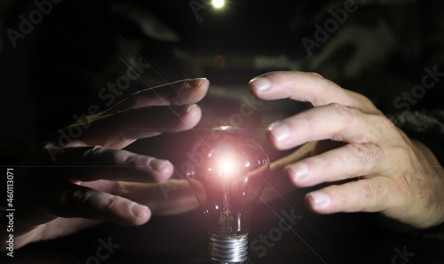 the man who wants to explain the increasing energy costs with a light bulb