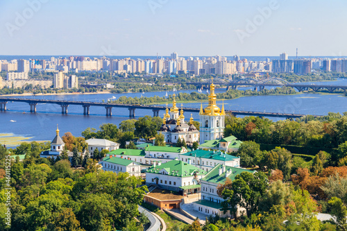 View of Kiev Pechersk Lavra (Kiev Monastery of the Caves) and the Dnieper river in Ukraine. View from Great Lavra Bell Tower © olyasolodenko