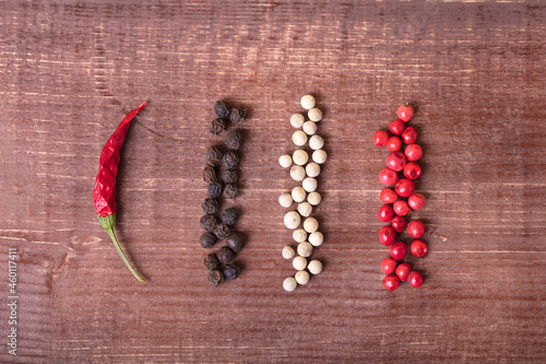 A kind of hot pepper that lies on the table. Spices and seasonings laid out on the table
