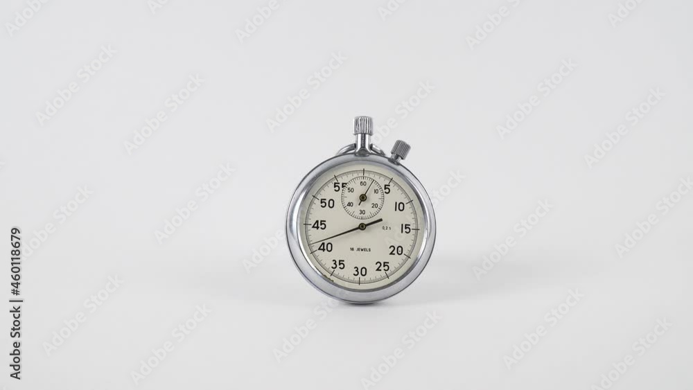 Analogue metal stopwatch on the white background. Classic metallic chrome mechanical analog stopwatch isolated on white background. Vintage stopwatch isolated on a white background. Analogue metal stopwatch on the white background. Classic metallic chrome mechanical analog stopwatch isolated on white background. Vintage stopwatch isolated on a white background.