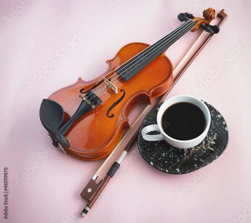 White ceramic cup with black coffee put on background