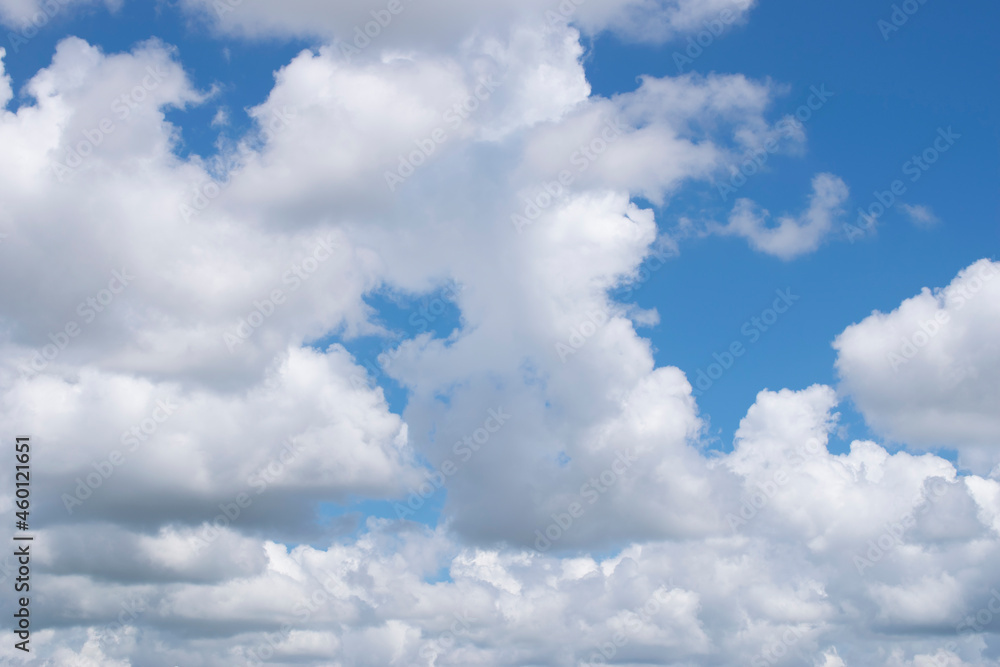 White clouds against a blue sky. Good daylight weather copy space for text White clouds against a blue sky. Good daylight weather copy space for text