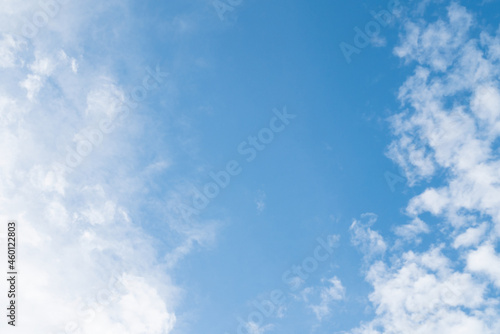 Natural clear blue sky with some clouds for background or backdrop freedom concept