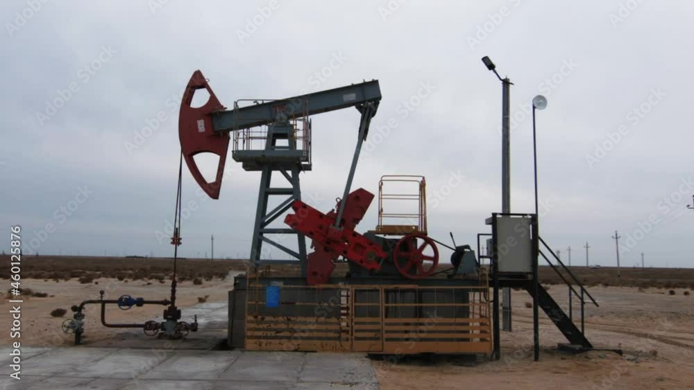 A stock video with an oil pumping machine is a wonderful fragment of video material, which presents footage of pumping oil from the bowels of the earth using a special machine. A stock video with an oil pumping machine is a wonderful fragment of video material, which presents footage of pumping oil from the bowels of the earth using a special machine.