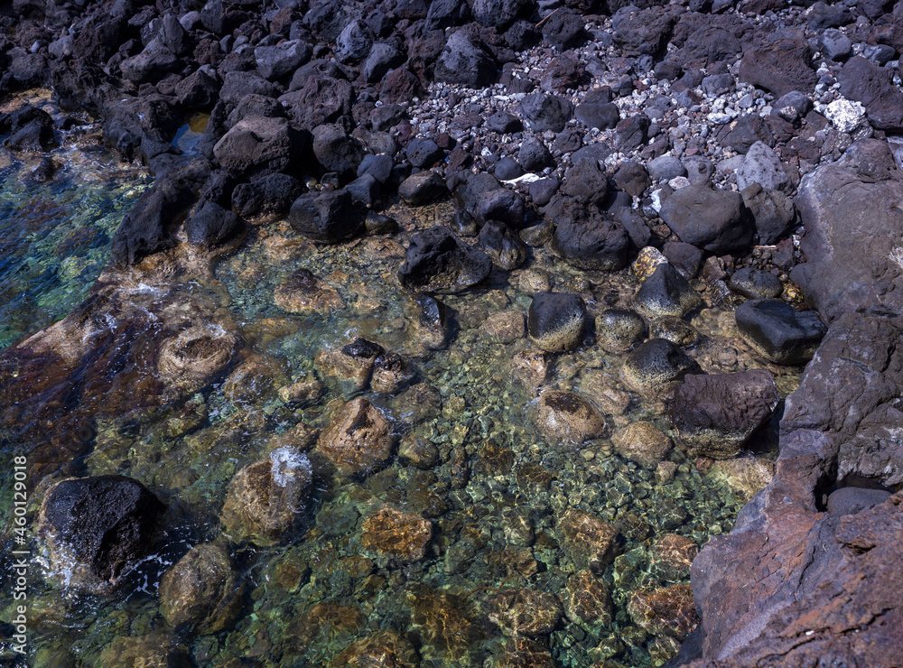View of the scenic lava rock cliff in the Linosa island. View of the scenic lava rock cliff in the Linosa island.