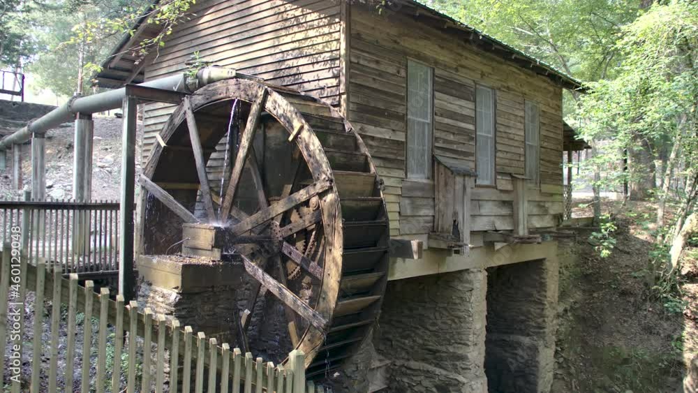 Georgia Hurricane Shoals Park A view of the back of the mill the water wheel and water pouring down Georgia Hurricane Shoals Park A view of the back of the mill the water wheel and water pouring down