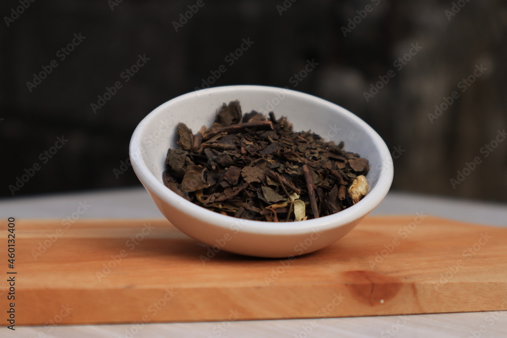 Tea leaves in a small bowl Tea leaves in a small bowl