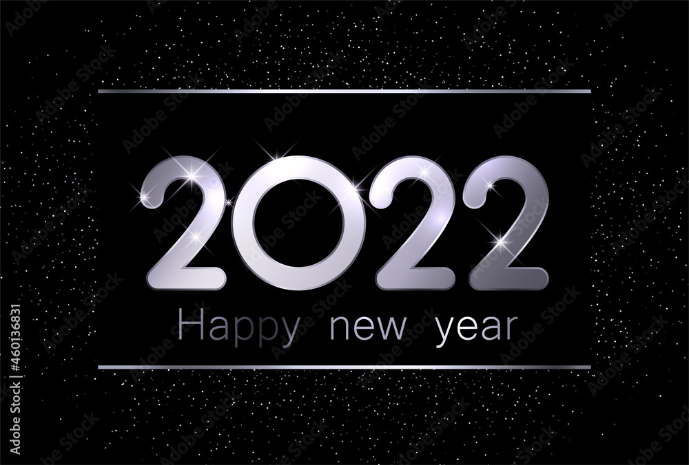 Glowing silver 2022 sign over starry night sky.