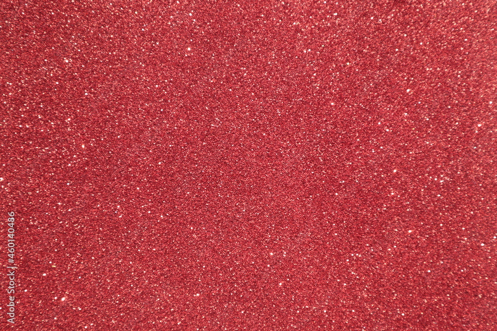 Red surface with glitter, use for background.	