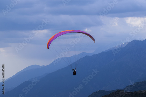 Paragliding in blue weather.