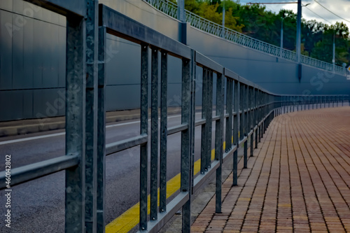 bridge fence railing next to the sidewalk