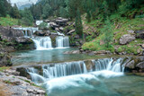 Long exposure of the Gradas De Soaso waterfall on the Arazas river during the summer, Ordesa National Park, Huesca, Spain.