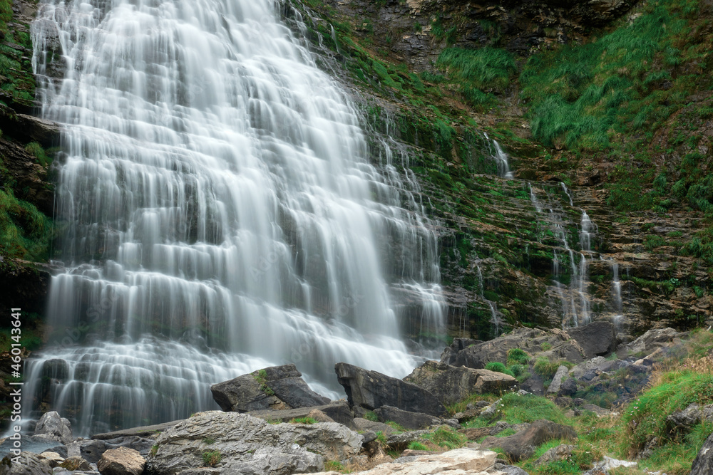 Cola de Caballo waterfall under Monte Perdido in the Ordesa Valley, Pyrenees of Spain. Cola de Caballo waterfall under Monte Perdido in the Ordesa Valley, Pyrenees of Spain.